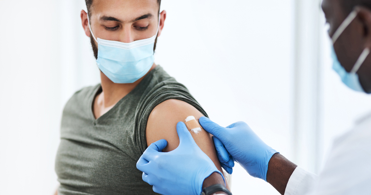 Man receiving vaccine