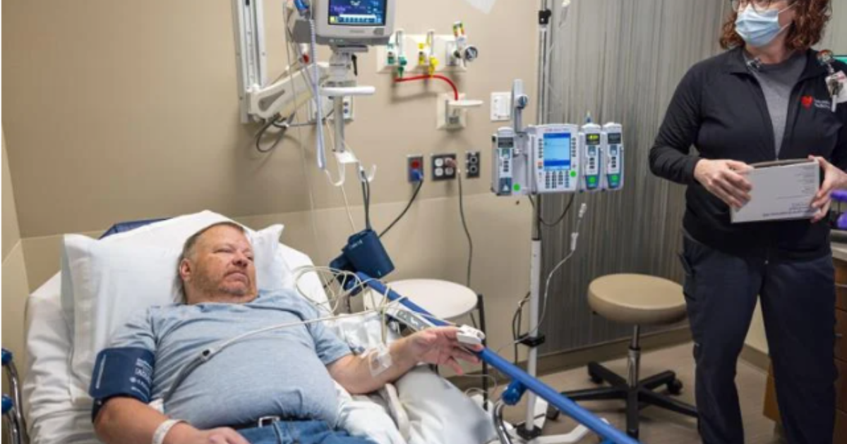 Chad Stevens traveled from his home in eastern Idaho in mid-October for an infusion with a gene therapy for hemophilia B. Here, he is overseen by Sarah Steffes, infusion staff nurse lead.