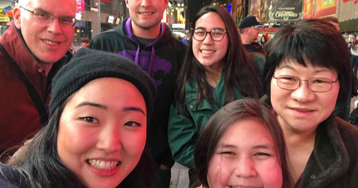 Junehee Kwon (far right), with her family at Time Square: (back row, from left to right) James Thompson, husband, Kyle Thompson, son, Faith Thompson, daughter; front row: Bonnie Lee, cousin and Grace Thompson, daughter.