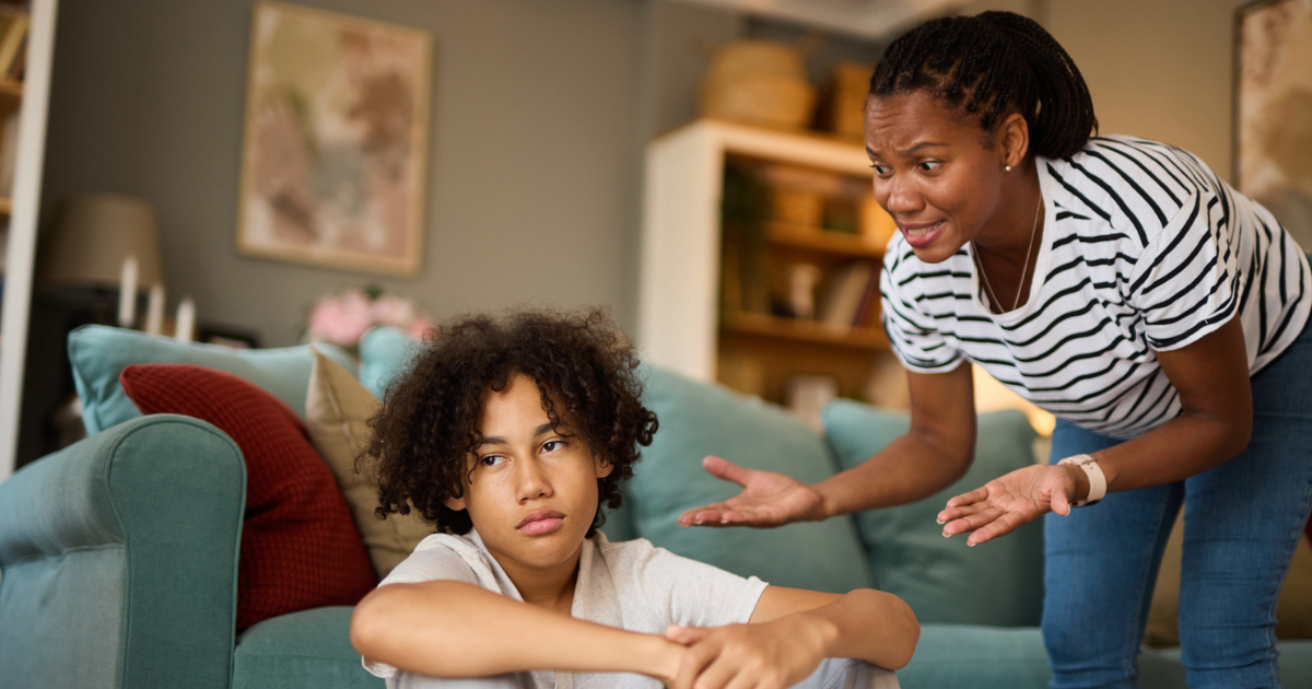 Mom and teenage son arguing