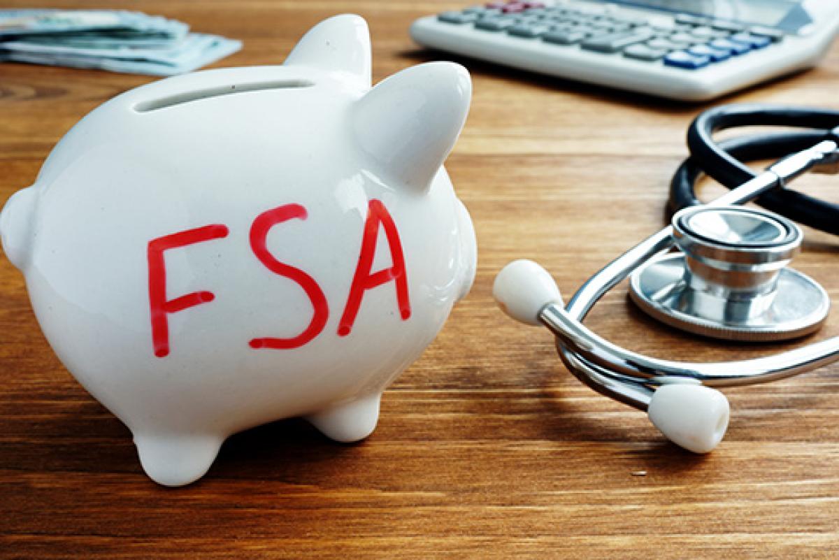 White piggy bank that says "FSA"