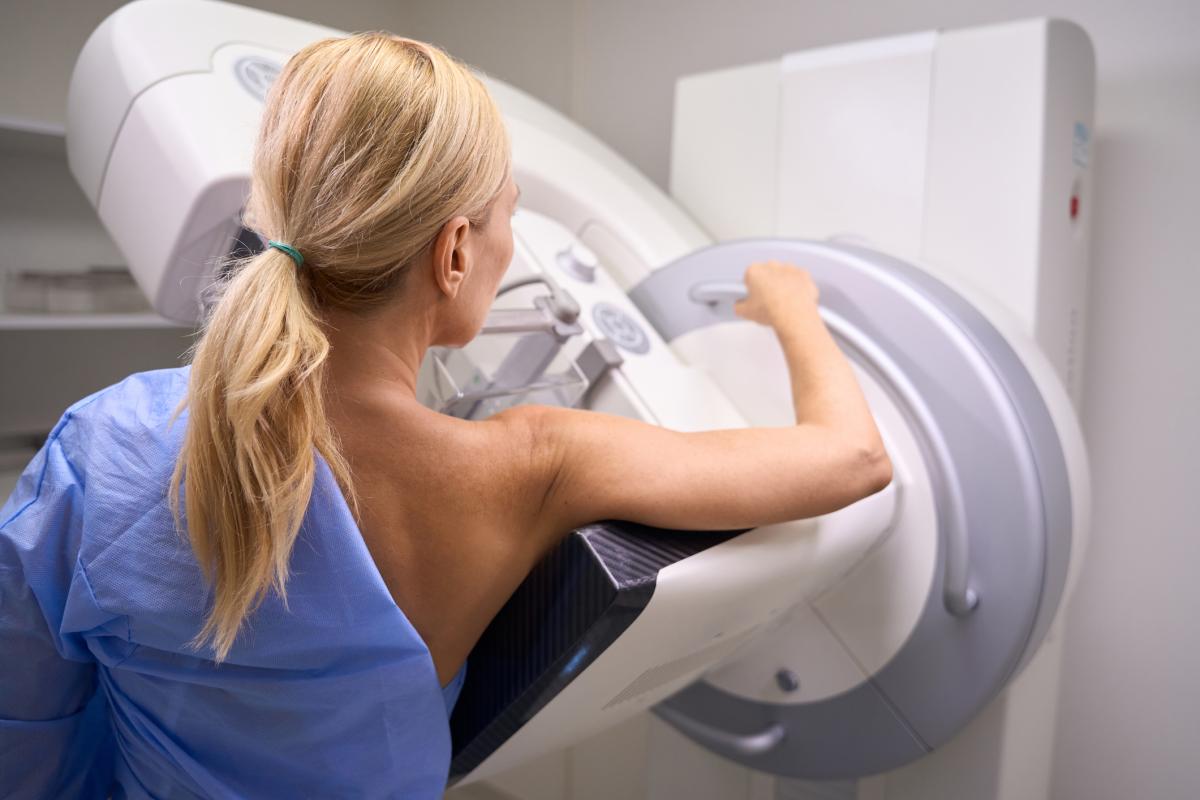 Woman getting a 3D mammogram