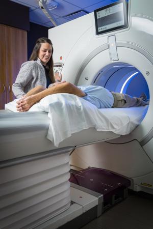 Cheri Taylor, CT technologist, with patient undergoing lung cancer screening