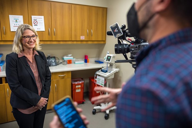 Whitney Goldner, MD, director of the Nebraska Medicine Thyroid and Endocrine Tumor Program, speaks with the news crew.