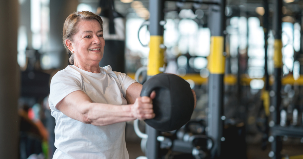 Woman holding medicine ball