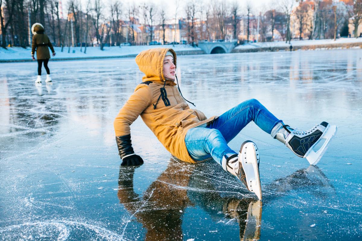 Man fallen while ice skating