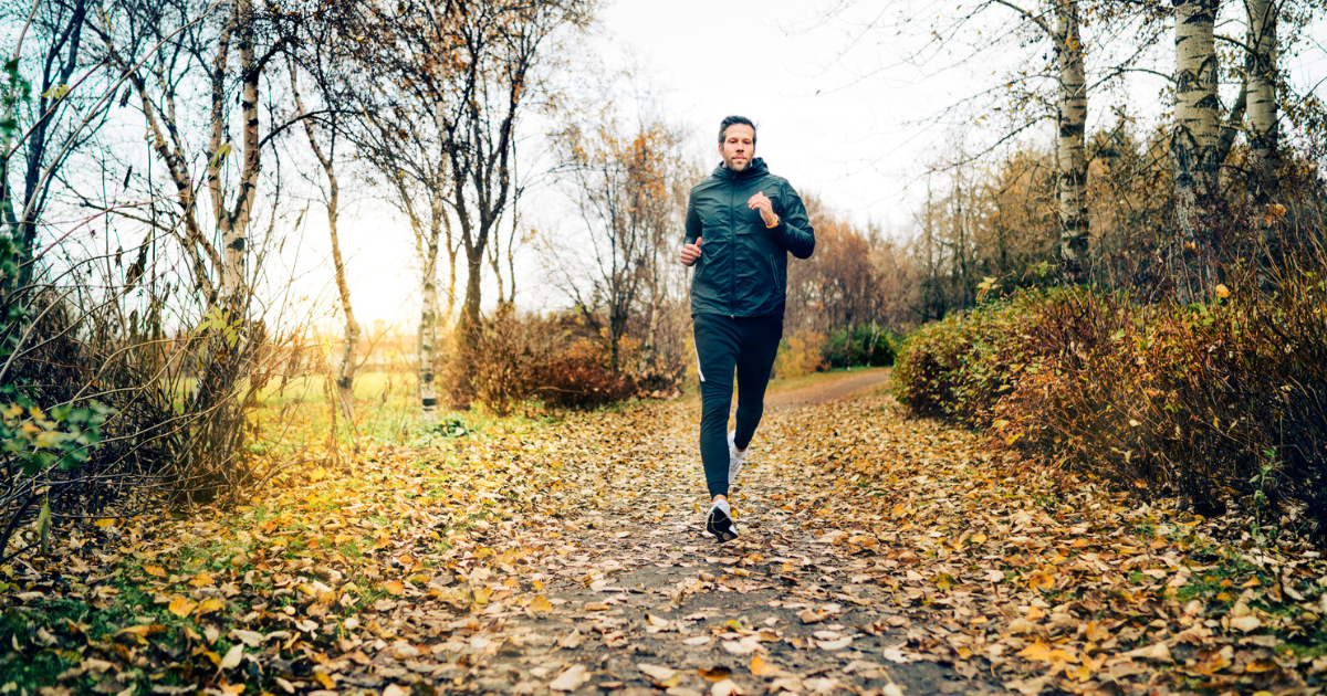 Man running on a trail