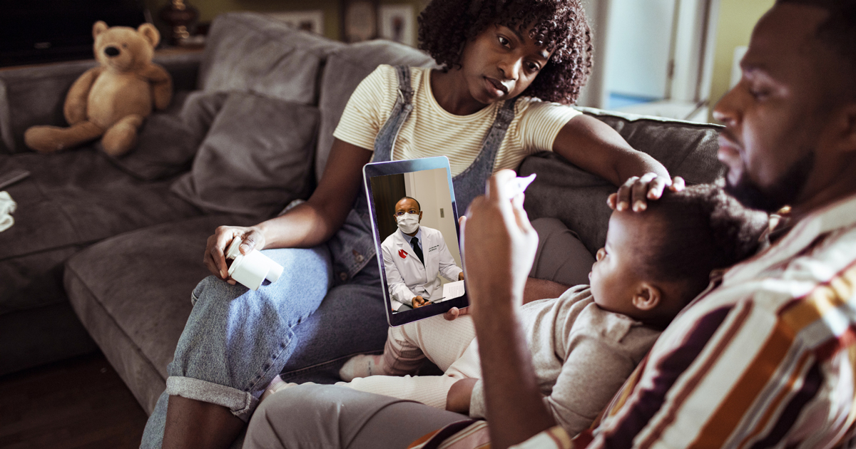 Mother, father, and young son on virtual visit with NM provider