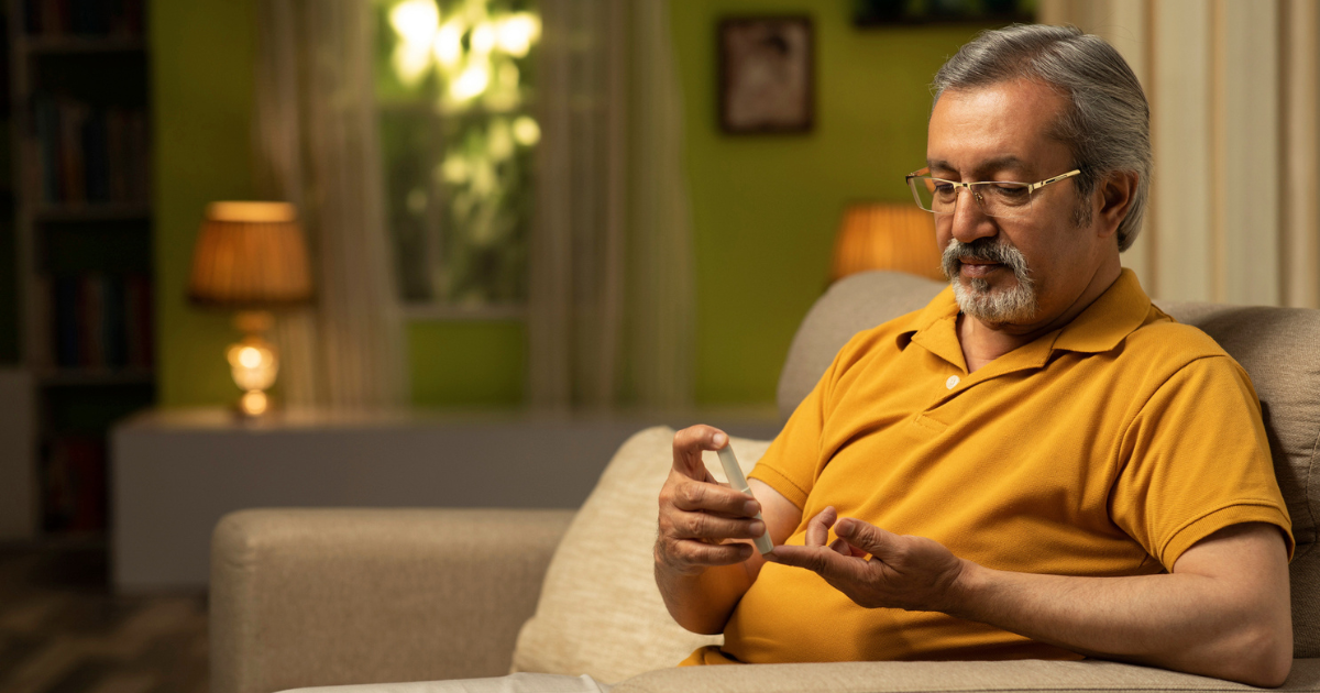 Man checking his blood sugar