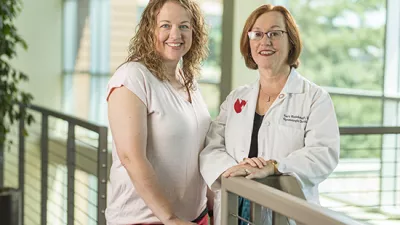 Kerry Rodabaugh, MD, gynecologic oncologist, with cervical cancer survivor Jackie Frum.