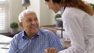 Older man talking to his doctor