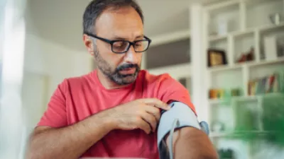 Man checking blood pressure