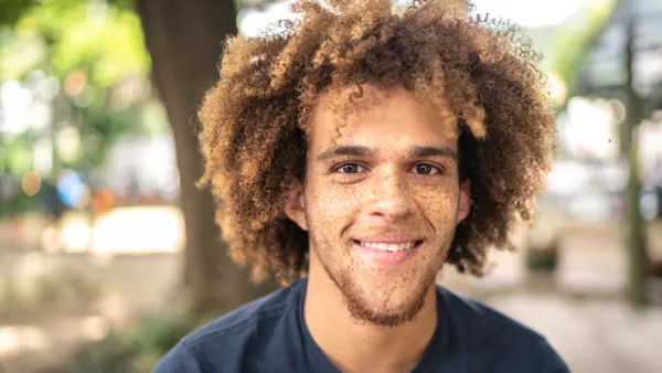 Smiling man with freckles