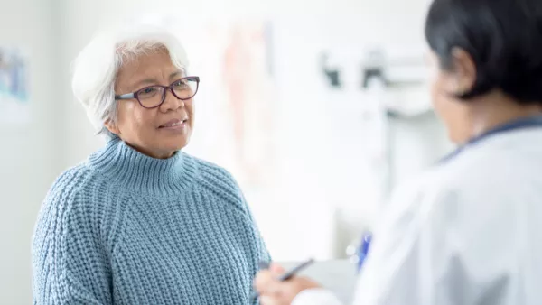 Older woman talking to her doctor