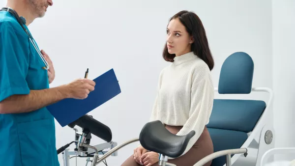 Woman talking to gynecologist