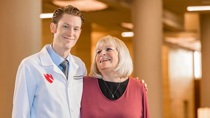 Cardiothoracic Surgeon David Berkheim, MD, left, with his patient, lung cancer survivor Kathy Watson.