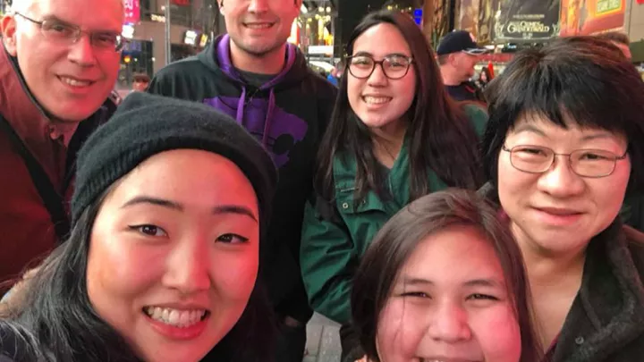 Junehee Kwon (far right), with her family at Time Square: (back row, from left to right) James Thompson, husband, Kyle Thompson, son, Faith Thompson, daughter; front row: Bonnie Lee, cousin and Grace Thompson, daughter.