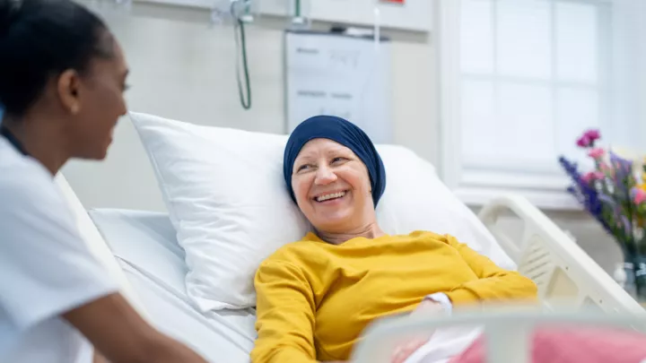 Nurse talking to cancer patient