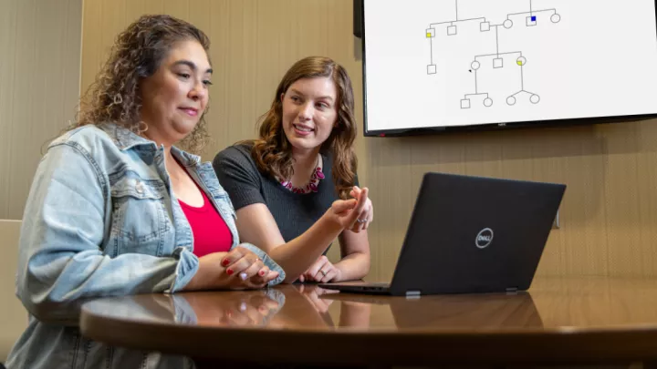 Gina Marchio, patient, with Jessie Poskochil, genetic counselor