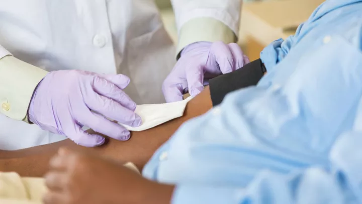 Close up of patient getting blood drawn