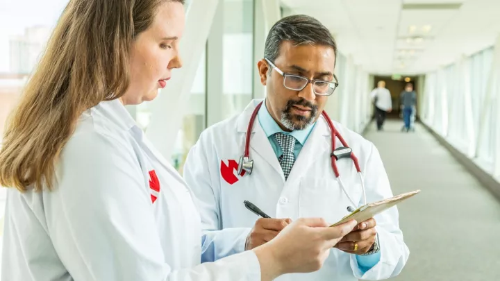 Shannon Pivovar, RN, clinical study nurse coordinator and Apar Kishor Ganti, MD, associate director of clinical trials.