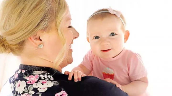 Lindsie Buchholz with daughter Elise. Photo courtesy: AHead Photography